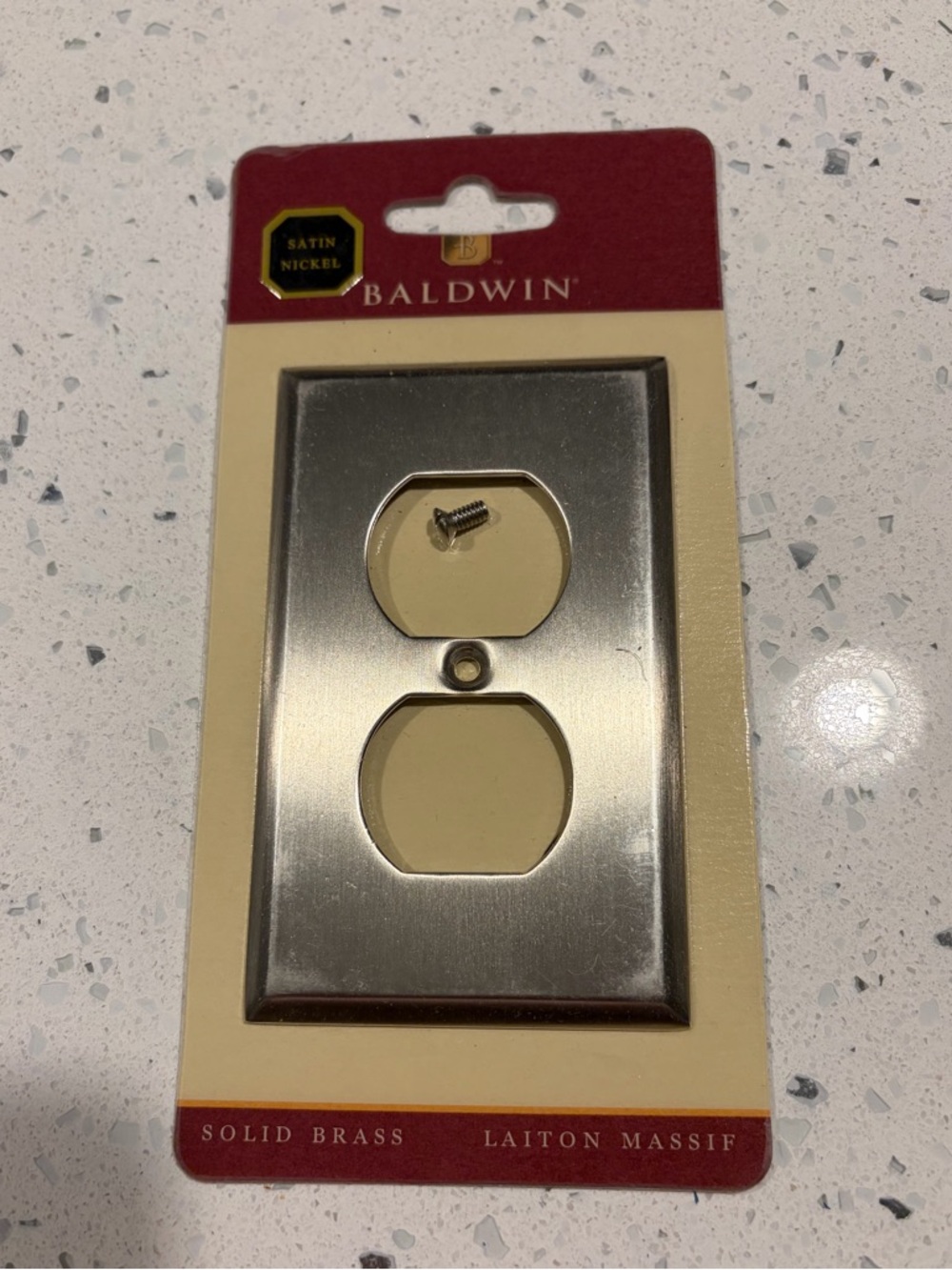 Baldwin Brass Finish Switch Plate Packaging with Yellow Label